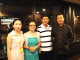 翔得夫妇与著名歌唱家王洁实、谢丽丝在十届北京国际艺博会上