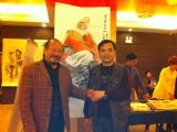 歌星腾格尔祝贺画家韩安东在周口维也纳大酒店书画拍卖成功