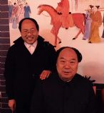和饰演毛泽东主席的特型演员李志江同志在一起合影