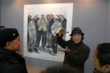 2013年尼玛泽仁老师在民族文化宫点评李辉作品《漫花儿》